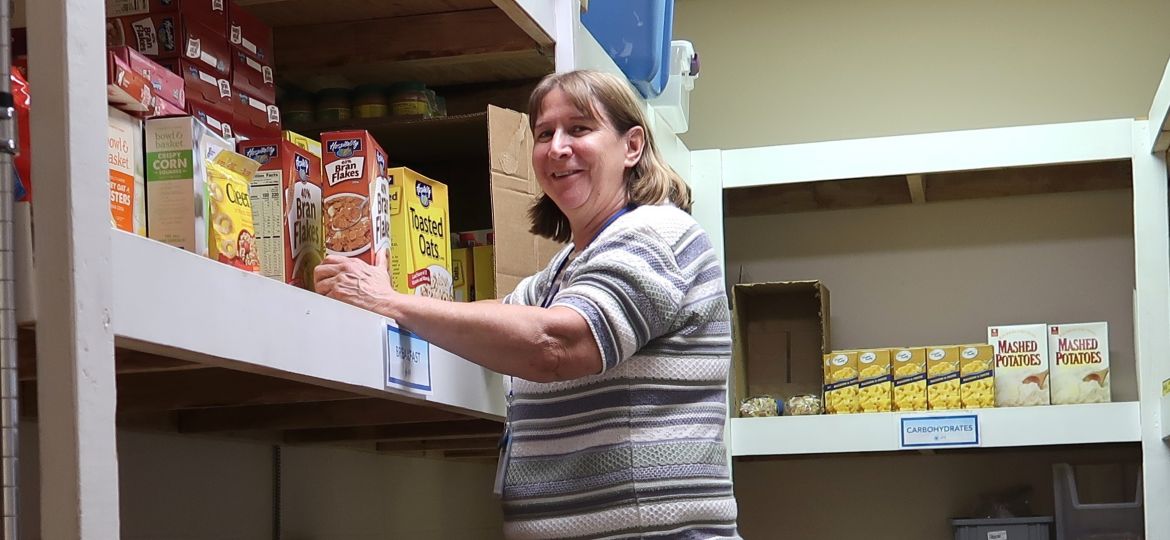 JFS' Lauren D'Agostino Sorting Food in the Agency's Pantry FINAL